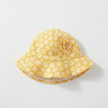 Baby floral sun hat in yellow with daisy pattern, wide brim